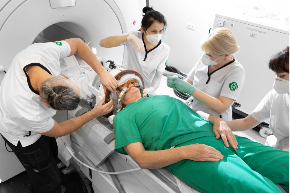 Figure 5.2. The team positions the patient before surgery using MRgFUS | VS Buzaev International MRgFUS Medical Treatment Centre Figure 5.2. The team positions the patient before surgery using MRgFUS