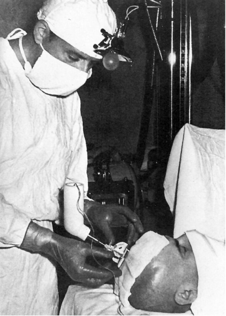 E.I. Kandel performs a stereotactic surgery on a patient with Parkinson's disease. 
